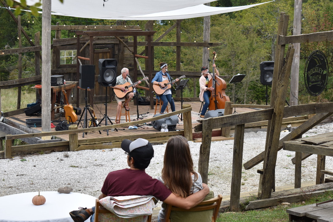 Music plays at the White Oak Theater stage at a concert and music festival
