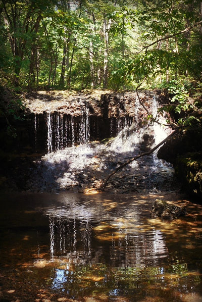 Dockley Ranch's waterfall is at the end of a hike through the forest